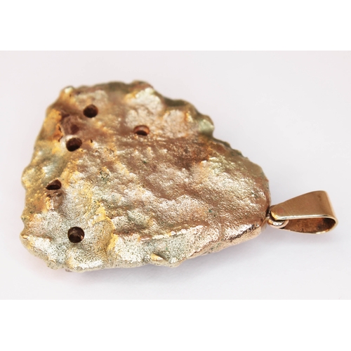 181 - A yellow metal pendant naturalistically formed as a gold nugget and set with five diamonds, gross we... 