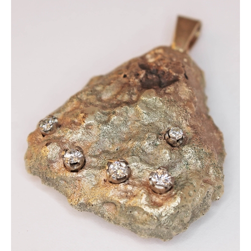 181 - A yellow metal pendant naturalistically formed as a gold nugget and set with five diamonds, gross we... 