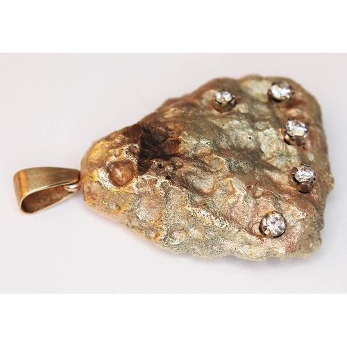 181 - A yellow metal pendant naturalistically formed as a gold nugget and set with five diamonds, gross we... 