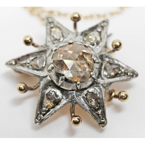 222 - A 19th century diamond cluster star brooch featuring a central rose cut diamond, diameter approx. 7m... 