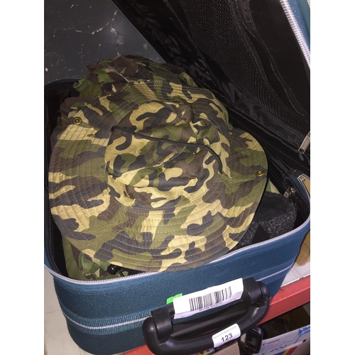 123 - A suitcase with army uniforms