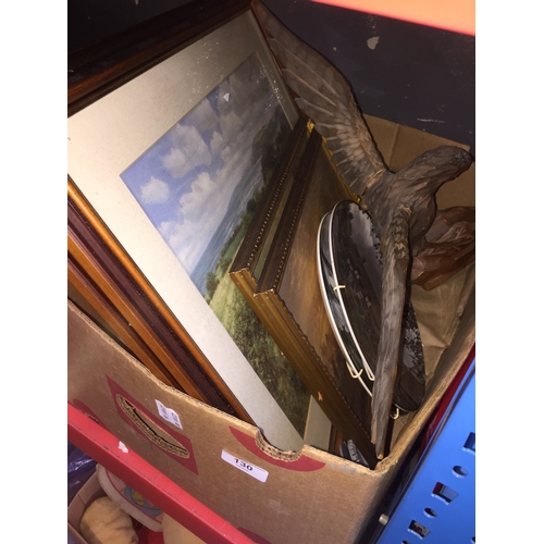 130 - A box of misc, including a wooden eagle and some prints