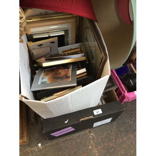 167 - A box of picture frames and 3 lamp shades