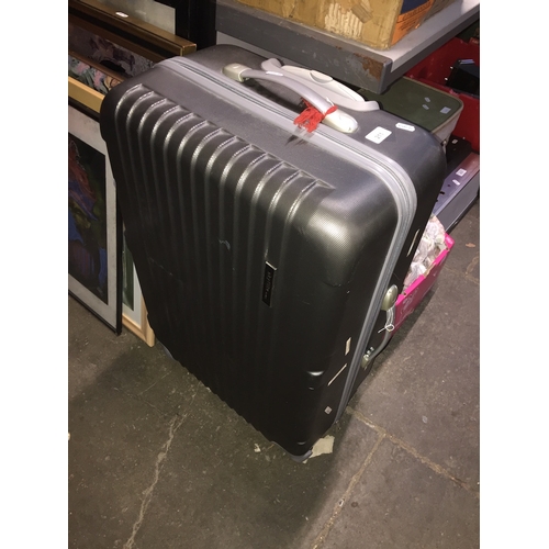 211 - A hard shell luggage suitcase on wheels