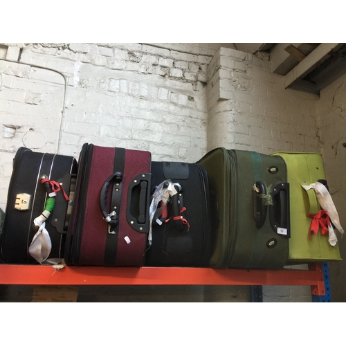 65 - 5 luggage suitcases on wheels