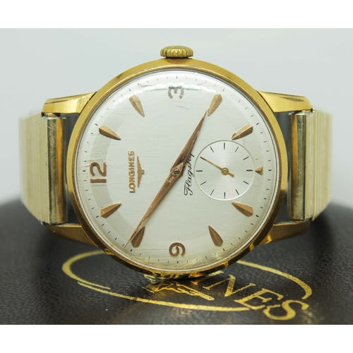 101 - A 1960s Longines Flagship gold plated gent's wristwatch, ref 6842-1, the silvered dial having gold f... 