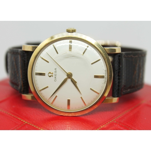 104 - A 1960s 9ct gold Omega wristwatch, mechanical wind calibre 520, on brown leather strap with box, cas... 