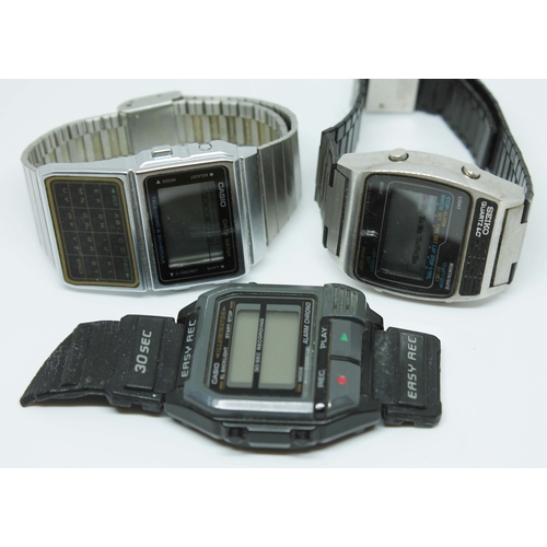 128 - A group of three retro digital quartz wristwatches comprising of a Casio Easy Record F-V2 (no strap)... 