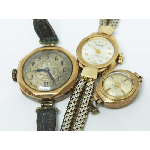 130 - Three hallmarked 9ct gold ladies mechanical manual wind wristwatches to include an Avia on gold plat... 