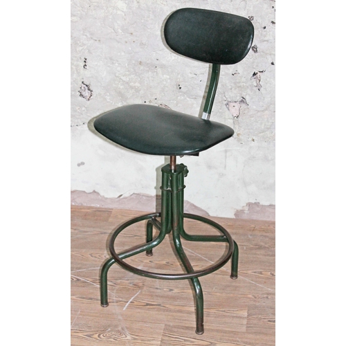 62 - A vintage green metal revolving chair by Tansad.