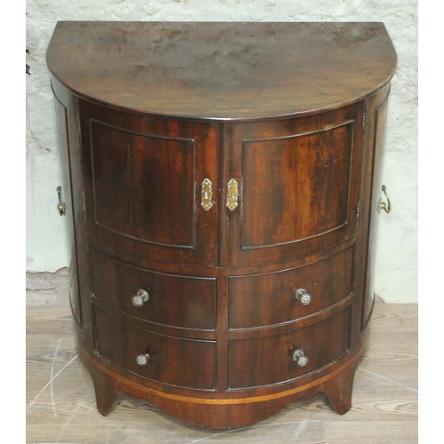 63 - A George III demi lune mahogany commode converted to cabinet with four lower drawers and splayed fee... 