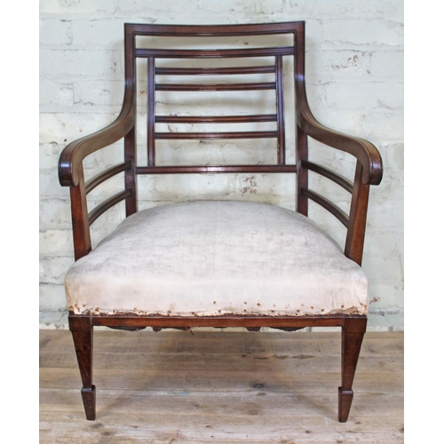 71 - A walnut armchair attributed to E.W. Godwin.