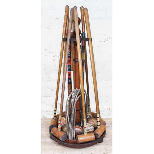 75 - A Victorian Jaques croquet set on stand.