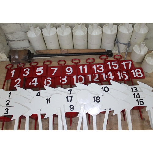 76 - An 18 hole pitch and putt golf set comprising hole cutter, hole markers, tee markers and holes.