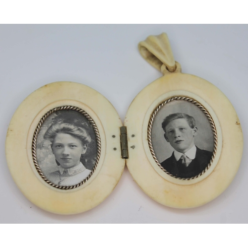 95 - A Victorian ivory locket pendant, length (including loop 6.5cm).