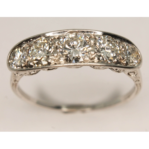 104 - An Art Deco style five stone diamond ring, total approx. diamond wt. 1.46 carats, white metal band u... 