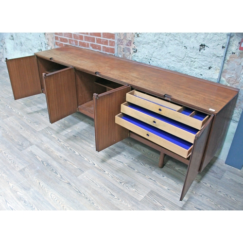 11 - A 1960s Danish style teak sideboard, length 228.5cm, depth 51cm & height 76cm.