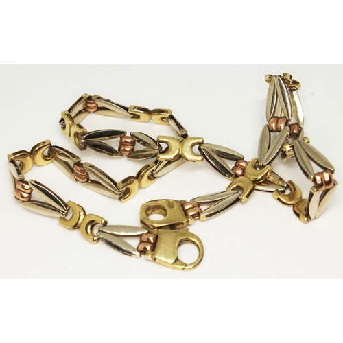 140 - A 9ct three colour gold chain, marked '375' and also with London import marks, length 41cm, wt. 21.8... 