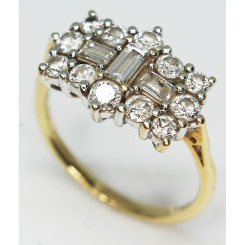 172 - A diamond cluster ring featuring three central baguette cut diamonds surrounded by 12 round brillian... 