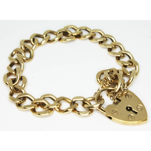 177 - A hallmarked 9ct gold link bracelet with heart shaped lock, length 18cm, wt. 22.5g.