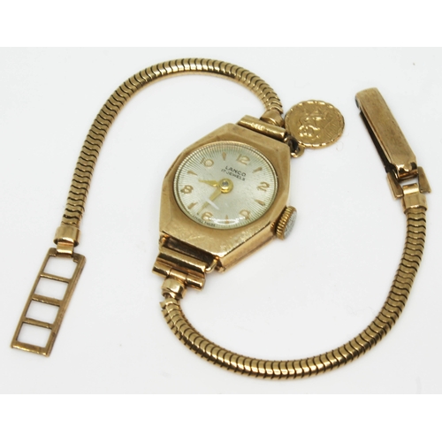 180 - A hallmarked 9ct gold wristwatch with 9ct gold strap, gross wt. 14.2g.