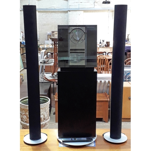 A Bang & Olufsen Beosound 3000 CD player and tuner with stand, a