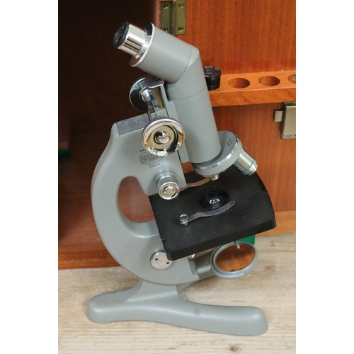 465 - A Beck model 47 microscope and box.