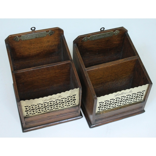 478 - A pair of late Victorian pierced brass and oak letter racks.