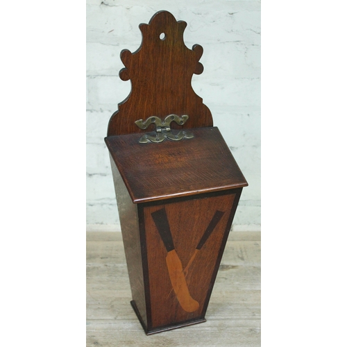 84 - A Georgian oak knife box inlaid with a carving knife and fork.