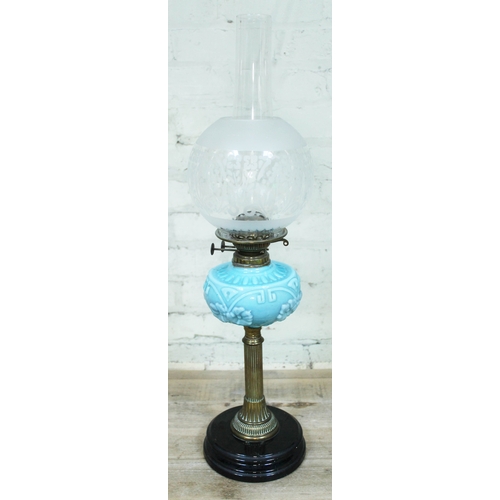 89 - A Victorian blue glass and brass parafin lamp, height 72cm.