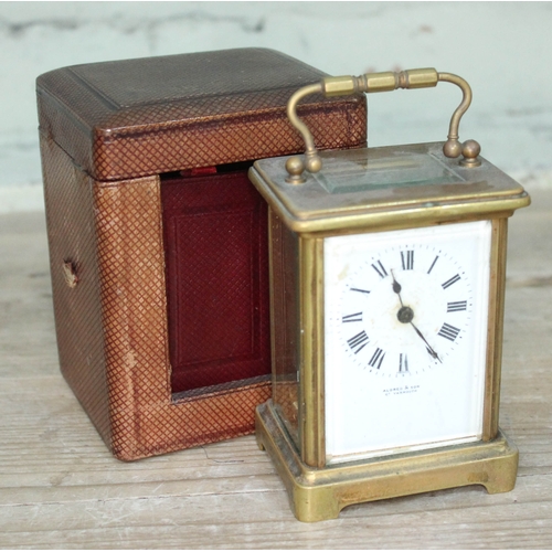 94 - A late 19th century brass carriage clock, the dial inscribed 'Aldred & Son', with leather case.