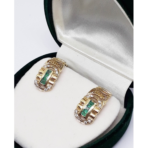 98 - A pair of 18ct gold emerald earrings, gross wt. 5.5g.