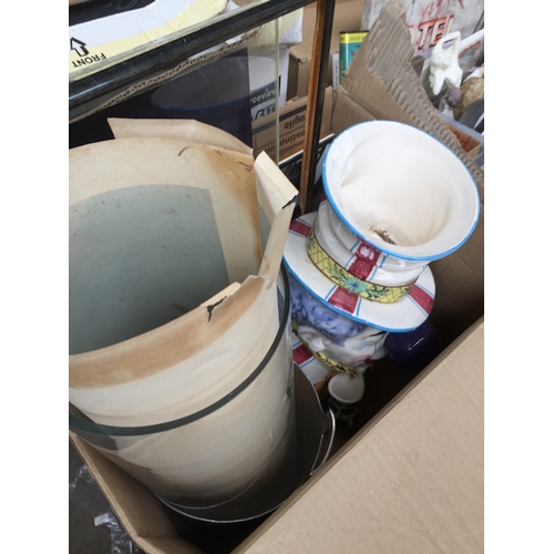 225 - A box of misc to include pictures, large glass vase, ornamental pottery large clown, etc