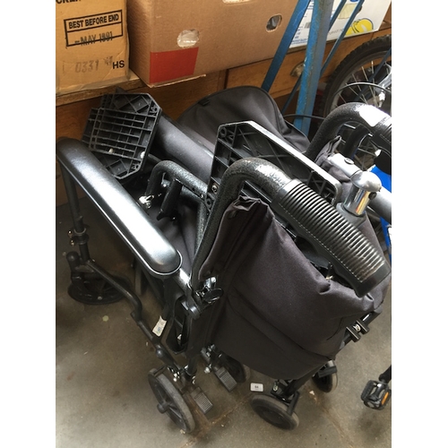 63 - A folding weelchair