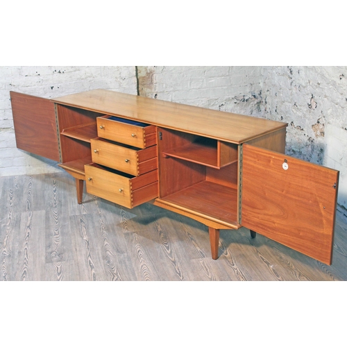 18 - An Alfred Cox Kenton sideboard for Heals, in French walnut with gilt brass knobs, 