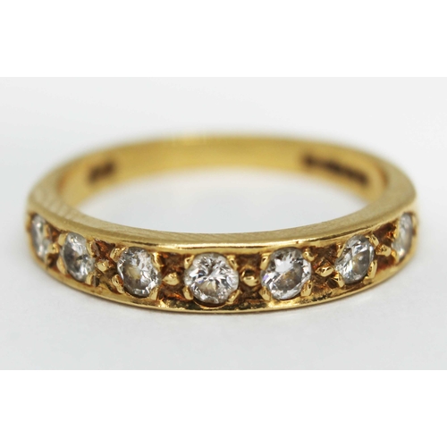 103 - A hallmarked 18ct gold seven stone diamond ring, gross wt. 3.4g, size N.