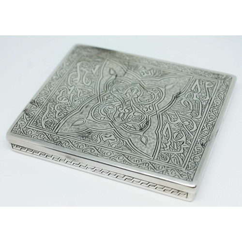 134 - An Egyptian silver cigarette case, 9cm x 8cm, wt. 3 1/2oz.