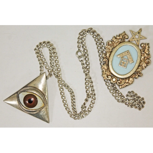 145 - A hallmarked silver Masonic jewel and a silver all seeing eye pendant marked '925' with import marks... 