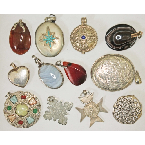 146 - A mixed lot of white metal and hard stone pendants and lockets.