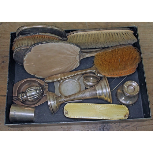 153 - A mixed lot of hallmarked silver including a dressing table set, two ash trays, sugar tongs etc.