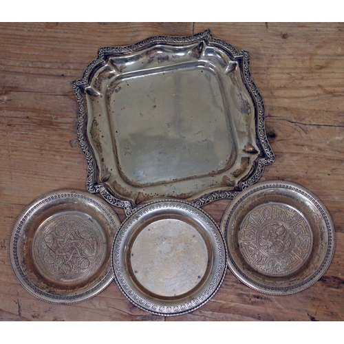 155 - A group of four Egyptian silver dishes, wt. 9 1/2oz.