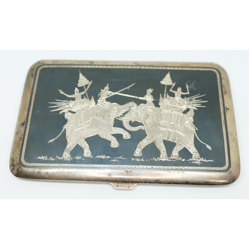 164 - An Eastern white cigarette case decorated with fighting elephants, length 13cm, wt. 4oz.