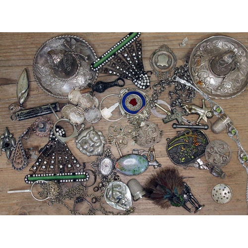 165 - A mixed lot of silver and white metal include to Mexican silver sombreros, a Scottish enamel brooch ... 