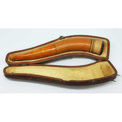 189 - A vintage butterscotch amber and meerschaum cheroot holder pipe and case.