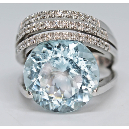 193 - An Italian aquamarine and diamond ring by Marco Zaia (K di Kuore), the round brilliant cut aquamarin... 