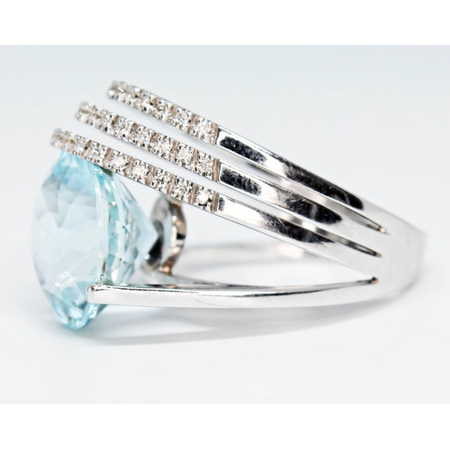 193 - An Italian aquamarine and diamond ring by Marco Zaia (K di Kuore), the round brilliant cut aquamarin... 