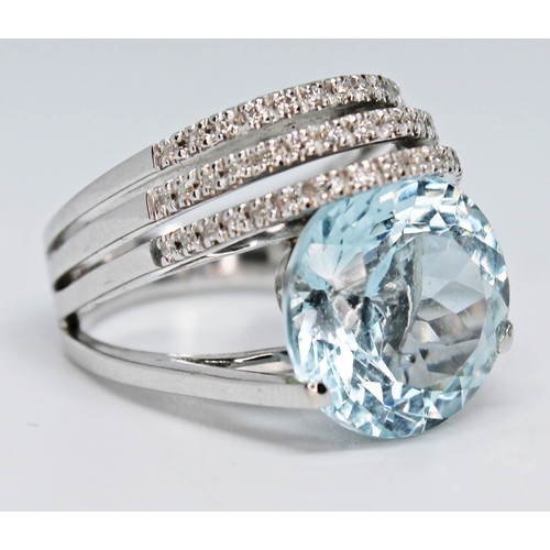 193 - An Italian aquamarine and diamond ring by Marco Zaia (K di Kuore), the round brilliant cut aquamarin... 