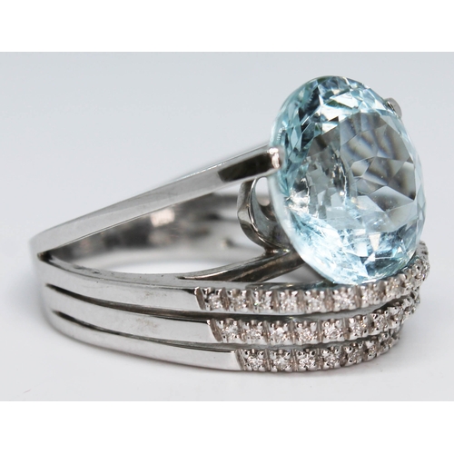 193 - An Italian aquamarine and diamond ring by Marco Zaia (K di Kuore), the round brilliant cut aquamarin... 