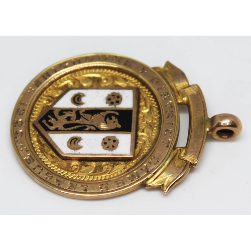 202 - A hallmarked 9ct gold enamel games medal, gross wt. 6.7g.