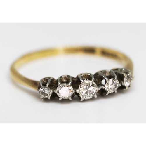 205 - A five stone diamond ring, marked '18ct', gross wt. 1.9g, size O.